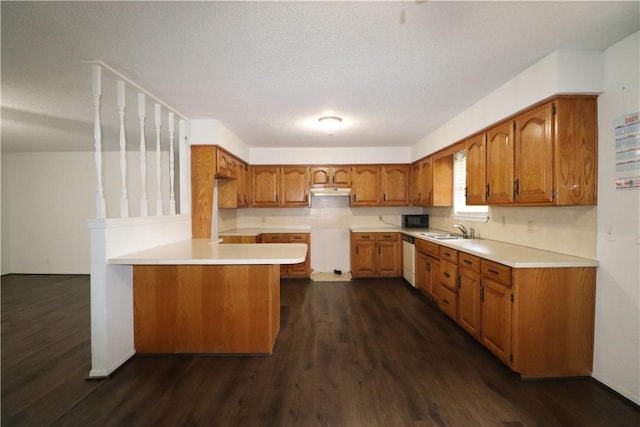 3064 Brandy Ln, Springdale, AR 72762 - kitchen featuring a sink, dark wood finished floors, brown cabinetry, dishwashing machine, and a peninsula