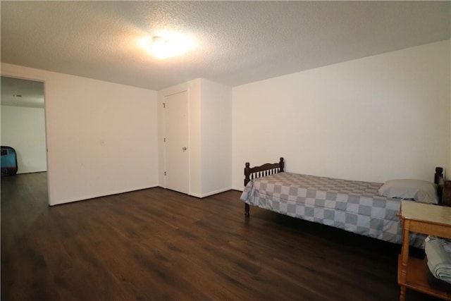 3064 Brandy Ln, Springdale, AR 72762 - bedroom with wood finished floors and a textured ceiling