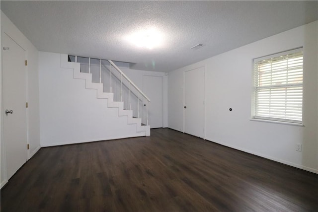 3064 Brandy Ln, Springdale, AR 72762 - basement with wood finished floors and a textured ceiling