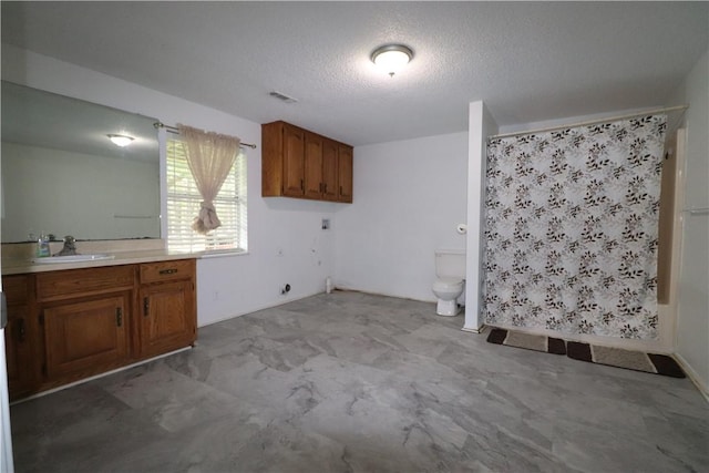 3064 Brandy Ln, Springdale, AR 72762 - laundry area featuring a textured ceiling and a sink