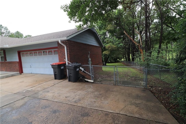 3064 Brandy Ln, Springdale, AR 72762 - garage with a gate and driveway