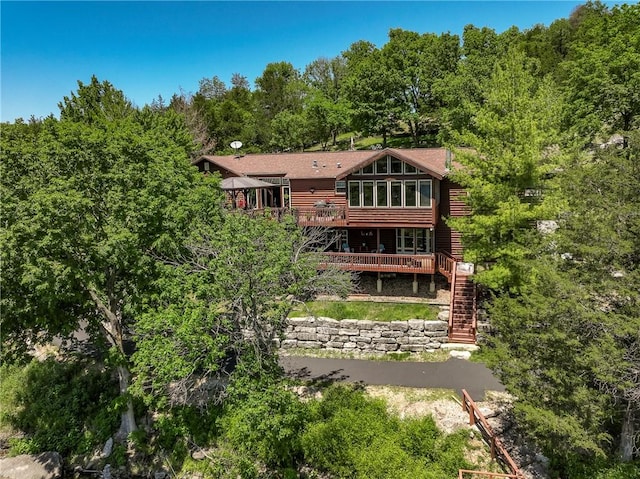 2895 County Road 116, Eureka Springs, AR 72631 - back of property featuring stairway and a wooden deck