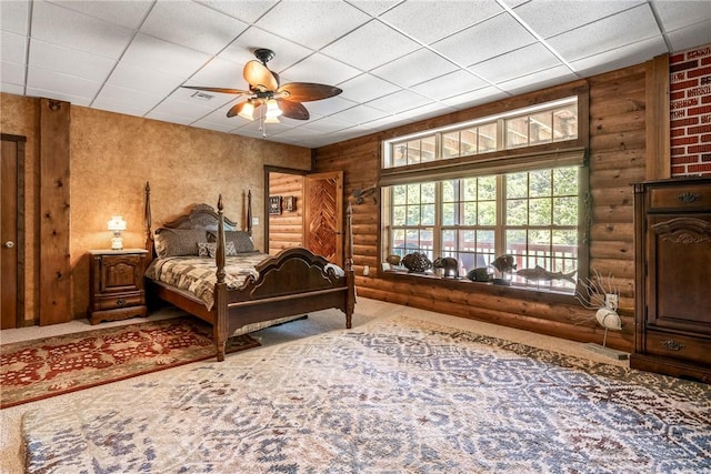 2895 County Road 116, Eureka Springs, AR 72631 - bedroom with carpet, rustic walls, and a drop ceiling