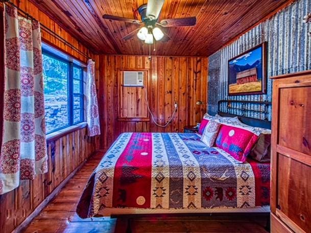 96NC6450 457 NC-6012, Jasper, AR 72641 - bedroom featuring wooden ceiling, hardwood / wood-style floors, and wood walls