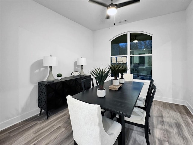 2822 N Grey Squirrel Dr, Fayetteville, AR 72704 - dining area featuring ceiling fan, wood finished floors, and baseboards