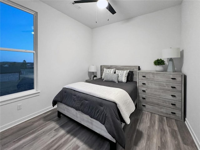 2822 N Grey Squirrel Dr, Fayetteville, AR 72704 - bedroom with wood finished floors, baseboards, and a ceiling fan