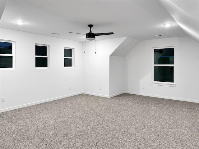 2822 N Grey Squirrel Dr, Fayetteville, AR 72704 - bonus room with carpet, ceiling fan, baseboards, and vaulted ceiling