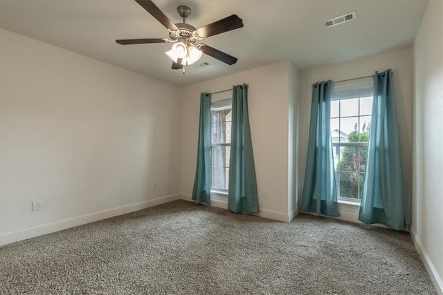 600 Gala Cir, Bentonville, AR 72712 - empty room featuring plenty of natural light, baseboards, and carpet flooring
