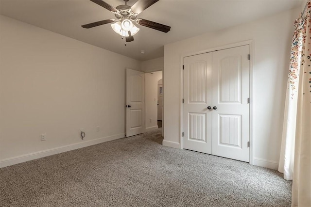 600 Gala Cir, Bentonville, AR 72712 - unfurnished bedroom featuring carpet flooring, baseboards, a closet, and a ceiling fan