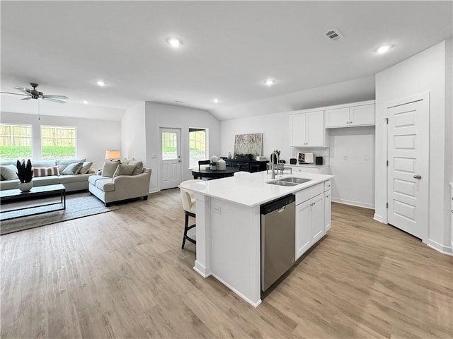 1661 Ridgeview Dr, Springdale, AR 72762 - kitchen featuring stainless steel dishwasher, a sink, white cabinetry, a center island with sink, and recessed lighting