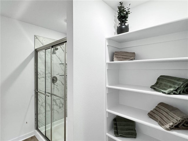 1661 Ridgeview Dr, Springdale, AR 72762 - full bathroom with a stall shower and baseboards