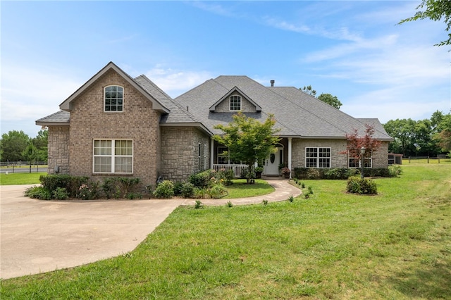 947 Cemetery Rd, Alma, AR 72921 - view of front facade featuring stone siding, covered porch, and roof with shingles