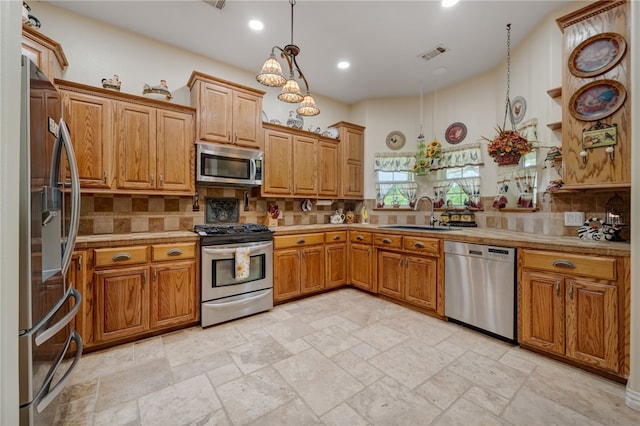 947 Cemetery Rd, Alma, AR 72921 - kitchen with appliances with stainless steel finishes, a sink, decorative backsplash, and recessed lighting
