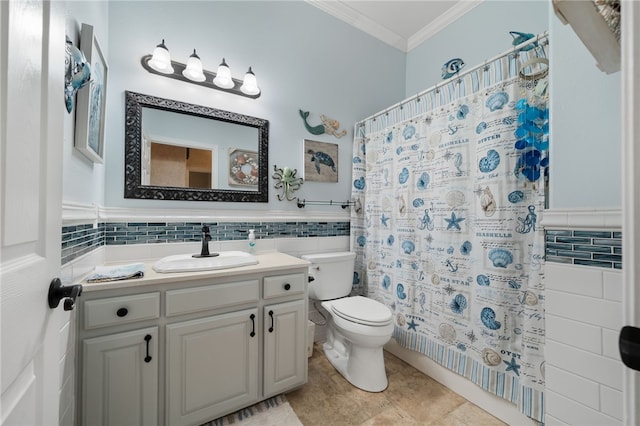 947 Cemetery Rd, Alma, AR 72921 - bathroom featuring ornamental molding, toilet, vanity, tile walls, and a wainscoted wall