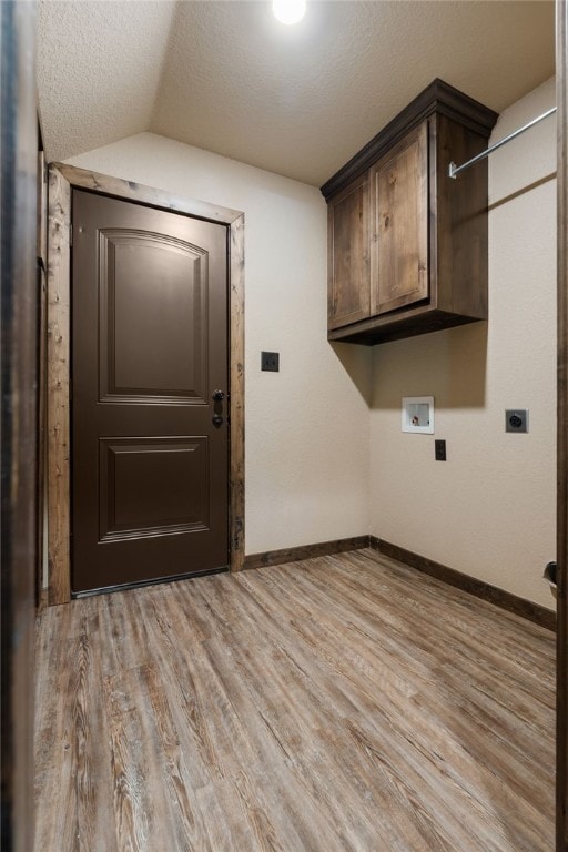 480124 E 1082nd Rd, Muldrow, OK 74948 - laundry area featuring cabinet space, washer hookup, light wood-style floors, baseboards, and hookup for an electric dryer