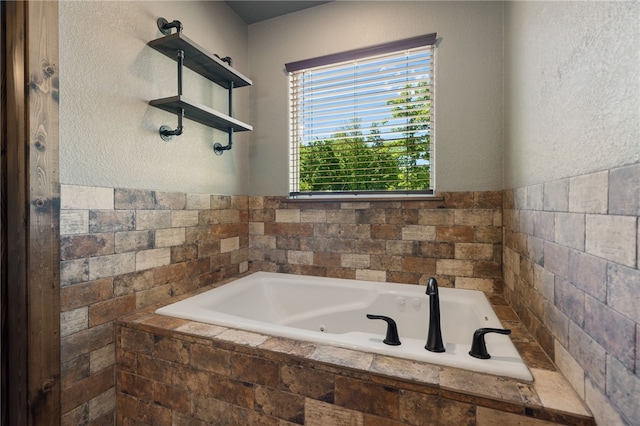 480124 E 1082nd Rd, Muldrow, OK 74948 - bathroom featuring a whirlpool tub and a textured wall