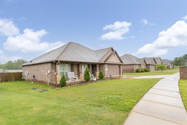 809 Dollar St, Cave Springs, AR 72718 - view of front of property featuring a porch, brick siding, a garage, and concrete driveway