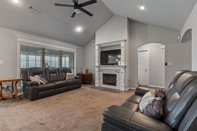809 Dollar St, Cave Springs, AR 72718 - carpeted living room with a ceiling fan, arched walkways, high vaulted ceiling, a fireplace, and recessed lighting