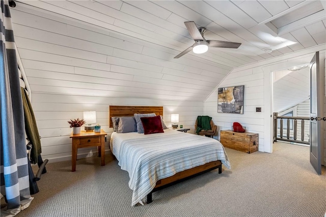 22283 N Log Cabin Dr, Sulphur Springs, AR 72768 - carpeted bedroom with lofted ceiling, wood walls, ceiling fan, and wooden ceiling