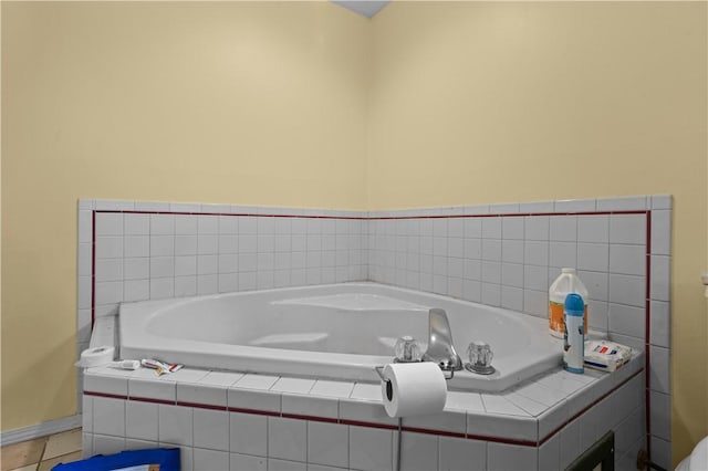 658 Walnut Ridge St, Centerton, AR 72719 - full bath featuring a garden tub, baseboards, and tile patterned floors