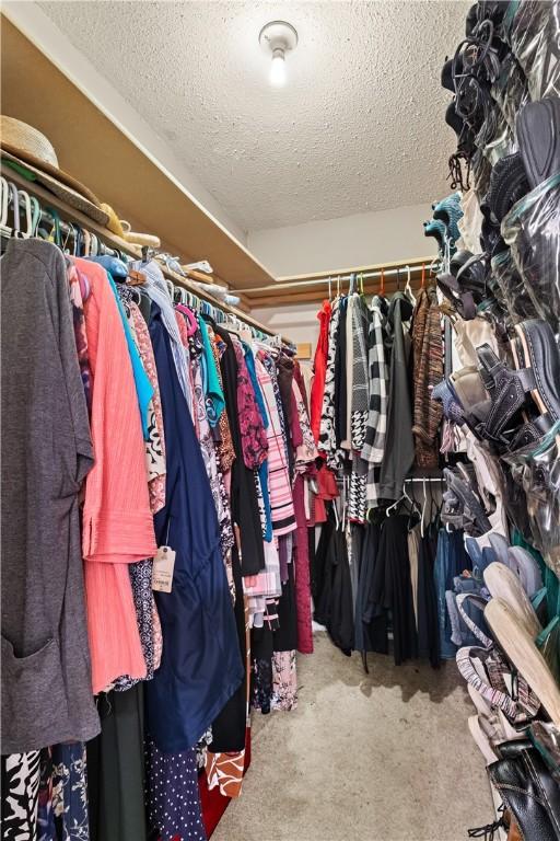 658 Walnut Ridge St, Centerton, AR 72719 - walk in closet featuring carpet flooring