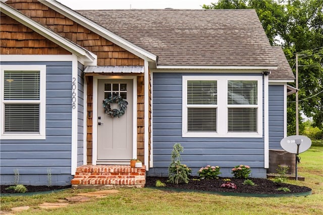 20608 Keck Rd, Siloam Springs, AR 72761 - entrance to property with roof with shingles and a yard