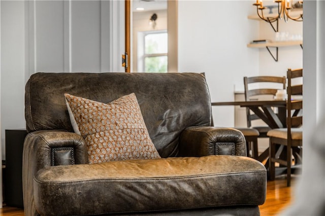 20608 Keck Rd, Siloam Springs, AR 72761 - living area with wood finished floors and a chandelier