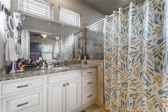 757 Harper Dr, Pea Ridge, AR 72751 - full bathroom with tiled shower, vanity, and ceiling fan