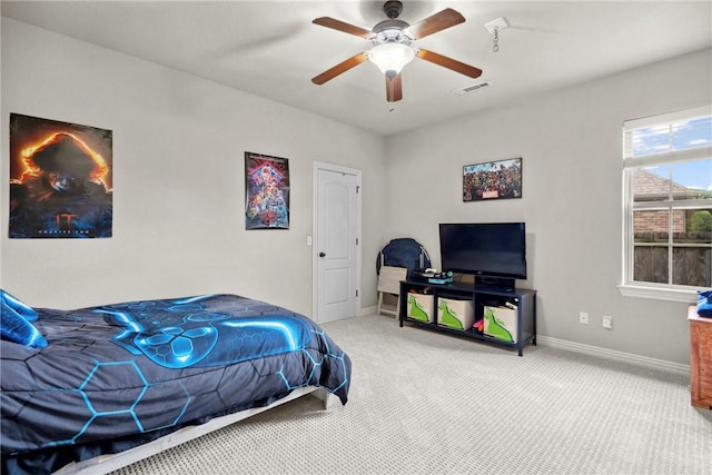 6401 S 42nd St, Rogers, AR 72758 - carpeted bedroom with baseboards and a ceiling fan