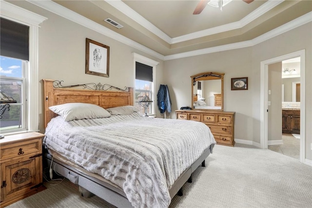6401 S 42nd St, Rogers, AR 72758 - bedroom featuring light colored carpet, crown molding, a ceiling fan, connected bathroom, and a tray ceiling