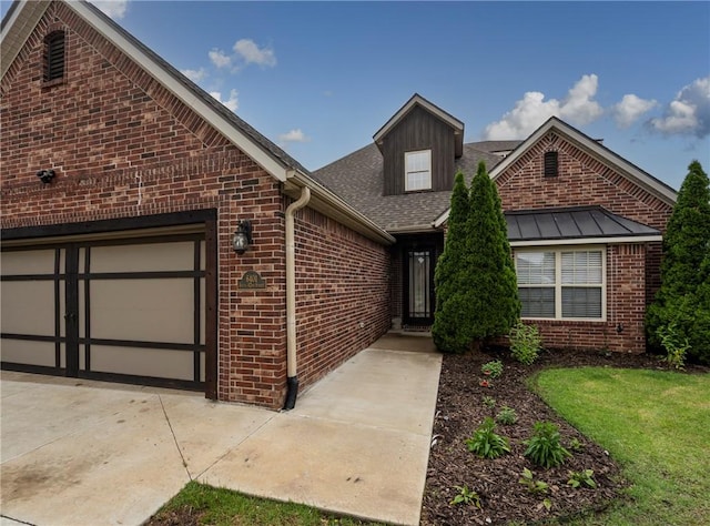 6401 S 42nd St, Rogers, AR 72758 - view of front facade with brick siding, a garage, and a shingled roof
