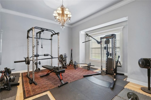 6401 S 42nd St, Rogers, AR 72758 - workout area featuring wood finished floors, baseboards, crown molding, and a chandelier