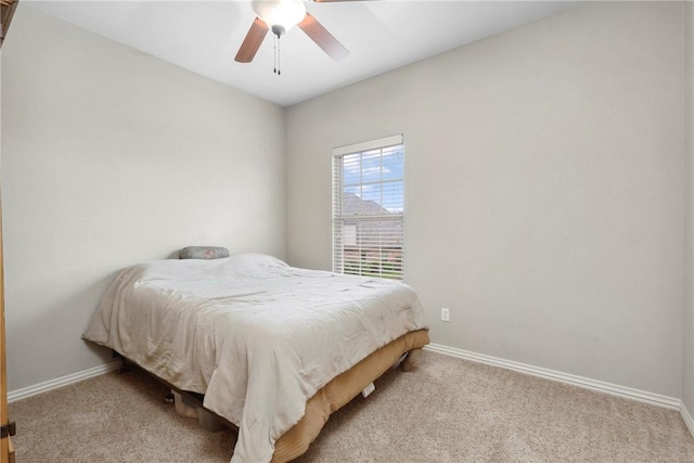 6401 S 42nd St, Rogers, AR 72758 - carpeted bedroom featuring baseboards and a ceiling fan