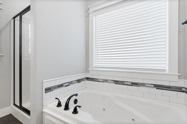 1265 Cassia, Tontitown, AR 72762 - full bathroom featuring a shower stall, a tub with jets, and healthy amount of natural light