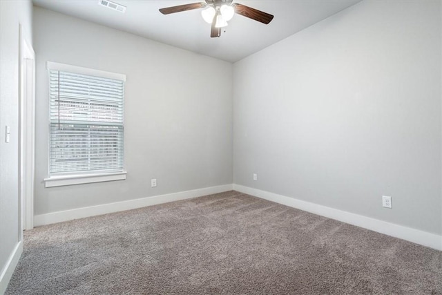 1265 Cassia, Tontitown, AR 72762 - carpeted spare room featuring ceiling fan and baseboards