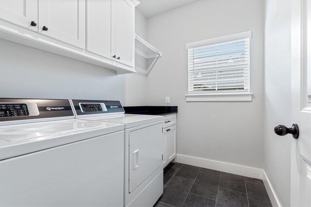 1265 Cassia, Tontitown, AR 72762 - laundry room with separate washer and dryer, cabinet space, baseboards, and dark tile patterned flooring