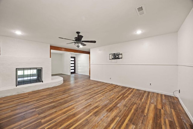 1149 Sunrise Ave, Springdale, AR 72764 - unfurnished living room with wood finished floors, ceiling fan, healthy amount of natural light, a fireplace, and recessed lighting