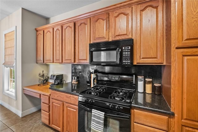 8200 Titleist Cir, Rogers, AR 72756 - kitchen with black appliances, backsplash, light tile patterned flooring, baseboards, and dark stone countertops