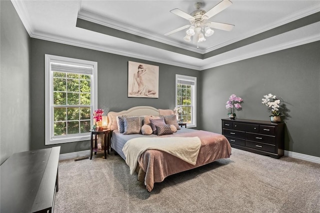 8200 Titleist Cir, Rogers, AR 72756 - carpeted bedroom with a tray ceiling, ornamental molding, baseboards, and a ceiling fan