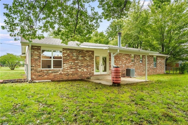 5479 Bob Mills Rd, Springdale, AR 72762 - rear view of property with french doors, cooling unit, a patio area, and brick siding