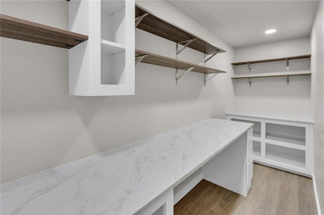 1115 Eicher Ave, Springdale, AR 72764 - spacious closet with wood finished floors