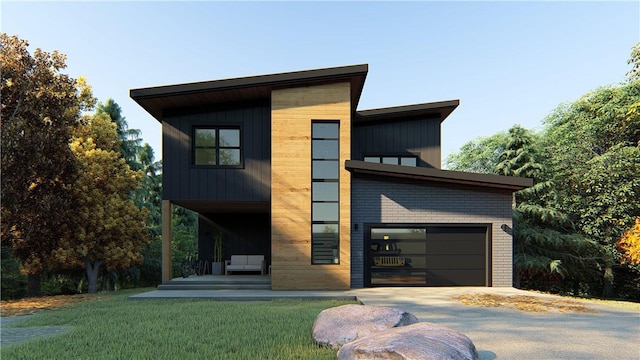 13 Abbotsley Ln, Bella Vista, AR 72714 - modern home featuring asphalt driveway, a front yard, and a garage