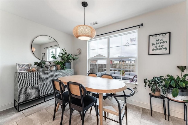 7533 Devonshire Ave, Springdale, AR 72762 - dining room with baseboards and light tile patterned floors