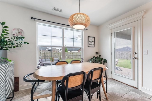 7533 Devonshire Ave, Springdale, AR 72762 - dining area featuring plenty of natural light and baseboards