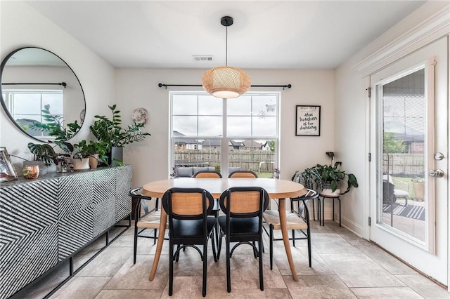 7533 Devonshire Ave, Springdale, AR 72762 - dining space with healthy amount of natural light and baseboards