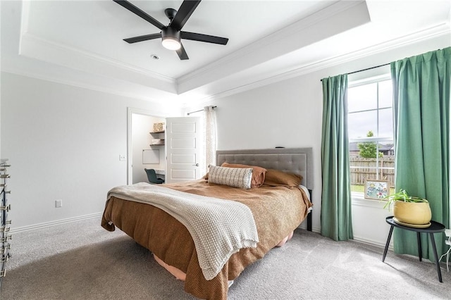 7533 Devonshire Ave, Springdale, AR 72762 - carpeted bedroom featuring a tray ceiling, ornamental molding, a ceiling fan, and baseboards