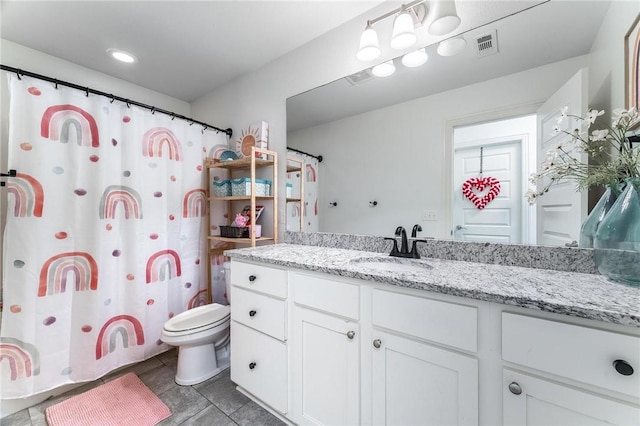 7533 Devonshire Ave, Springdale, AR 72762 - bathroom with toilet, vanity, and tile patterned floors