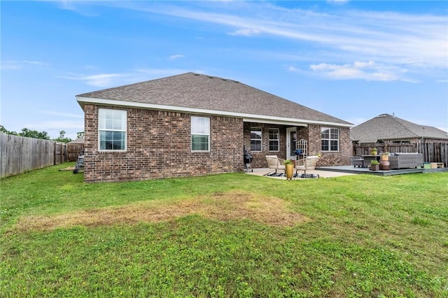 7533 Devonshire Ave, Springdale, AR 72762 - back of house featuring a patio, roof with shingles, and brick siding