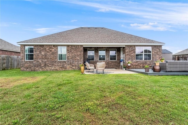 7533 Devonshire Ave, Springdale, AR 72762 - rear view of house featuring brick siding, a patio area, outdoor lounge area, and a shingled roof