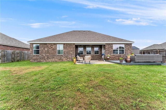 7533 Devonshire Ave, Springdale, AR 72762 - back of house featuring brick siding, a patio area, and a wooden deck